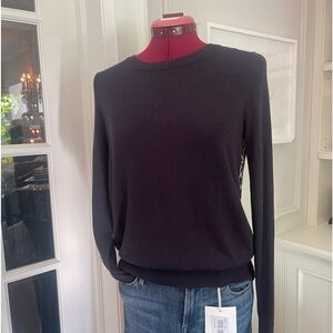 Beautiful black long sleeve and a brand new pair of jeans